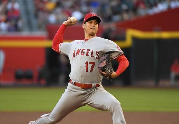 Shohei Ohtani of the Los Angeles Angels delivers a first inning pitch against the Arizona Diamondbacks at Chase Field on June 11, 2021 in Phoenix,...