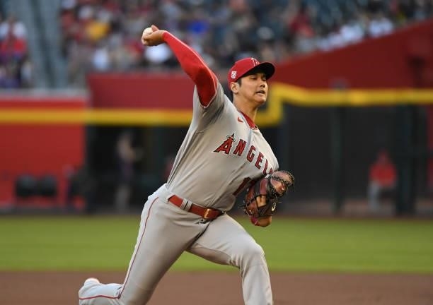 Shohei Ohtani of the Los Angeles Angels delivers a first inning pitch against the Arizona Diamondbacks at Chase Field on June 11, 2021 in Phoenix,...