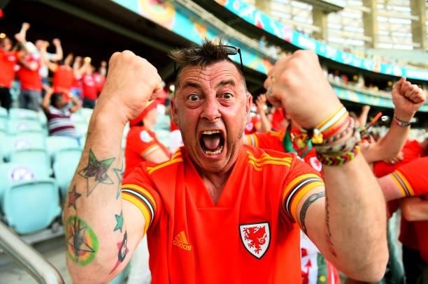 Supporter of Wales celebrates a goal during the UEFA Euro 2020 Championship Group A match between Wales and Switzerland on June 12, 2021 in Baku,...