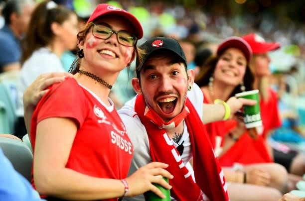 Supporters of Switzerland smile during the UEFA Euro 2020 Championship Group A match between Wales and Switzerland on June 12, 2021 in Baku,...
