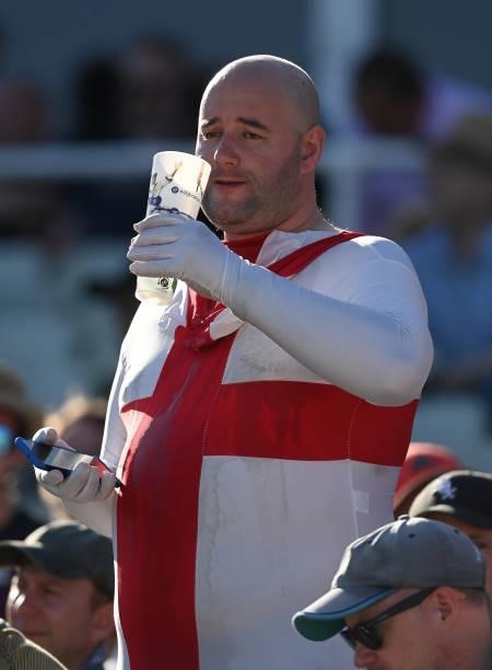 An England fan in fancy dress has a drink during the third day of the second LV= Test Match between England and New Zealand at Edgbaston on June 12,...