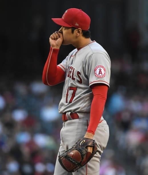 Shohei Ohtani of the Los Angeles Angels prepares to deliver a second inning pitch against the Arizona Diamondbacks at Chase Field on June 11, 2021 in...