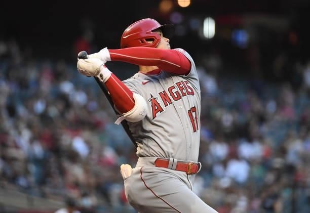 Shohei Ohtani of the Los Angeles Angels follows through on a swing against the Arizona Diamondbacks at Chase Field on June 11, 2021 in Phoenix,...