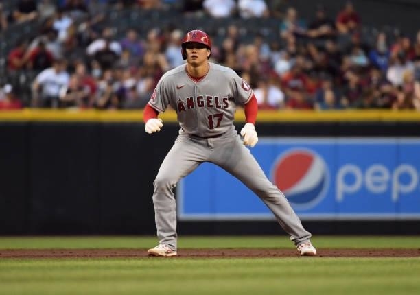 Shohei Ohtani of the Los Angeles Angels takes a lead from second base against the Arizona Diamondbacks at Chase Field on June 11, 2021 in Phoenix,...