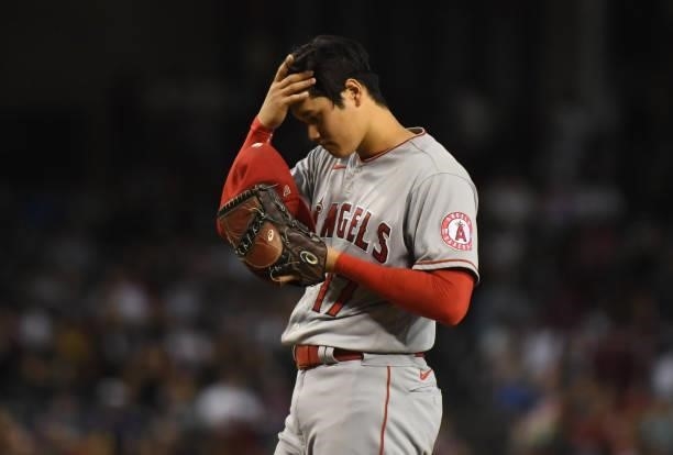 Shohei Ohtani of the Los Angeles Angels prepares to deliver a pitch against the Arizona Diamondbacks at Chase Field on June 11, 2021 in Phoenix,...
