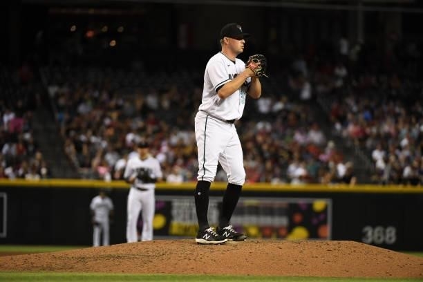 Joe Mantiply of the Arizona Diamondbacks delivers a pitch against the Los Angeles Angels at Chase Field on June 11, 2021 in Phoenix, Arizona.