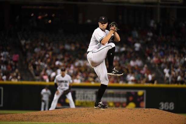 Joe Mantiply of the Arizona Diamondbacks delivers a pitch against the Los Angeles Angels at Chase Field on June 11, 2021 in Phoenix, Arizona.