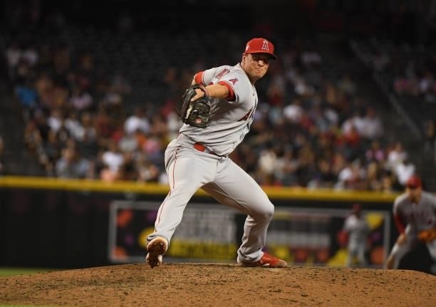 Tony Watson of the Los Angeles Angels delivers a pitch against the Arizona Diamondbacks at Chase Field on June 11, 2021 in Phoenix, Arizona.