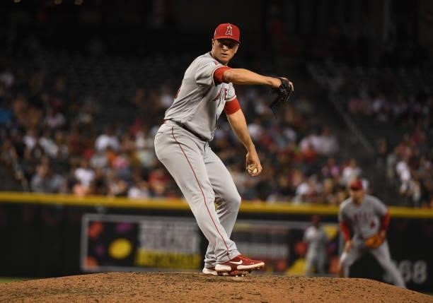 Tony Watson of the Los Angeles Angels delivers a pitch against the Arizona Diamondbacks at Chase Field on June 11, 2021 in Phoenix, Arizona.