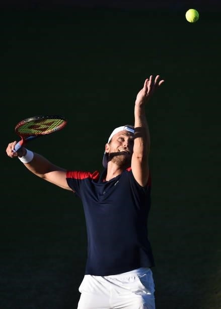 Denis Kudla of United States serves to Kamil Majchrzak of Poland during the men's semi-finals singles match on day eight of the Viking Open at...