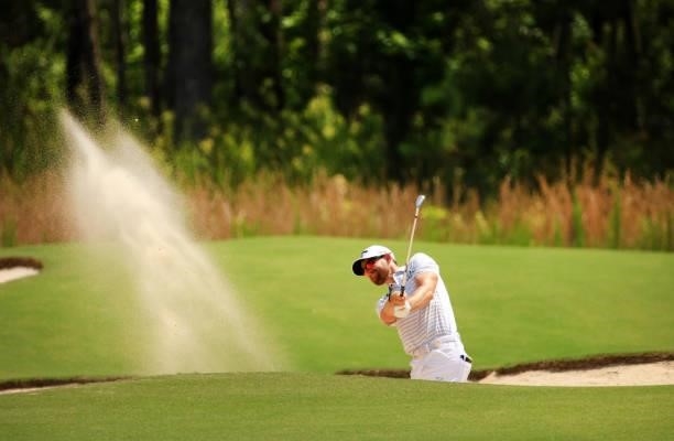 Patrick Rodgers plays a shot from a bunker on the 11th hole during the third round of the Palmetto Championship at Congaree on June 12, 2021 in...