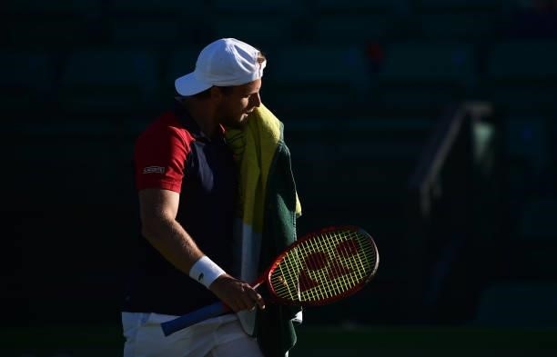 Denis Kudla of United States wipes his face as he plays against Kamil Majchrzak of Poland during the men's semi-finals singles match on day eight of...