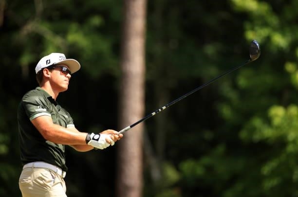 Garrick Higgo of South Africa plays his shot from the 12th tee during the third round of the Palmetto Championship at Congaree on June 12, 2021 in...
