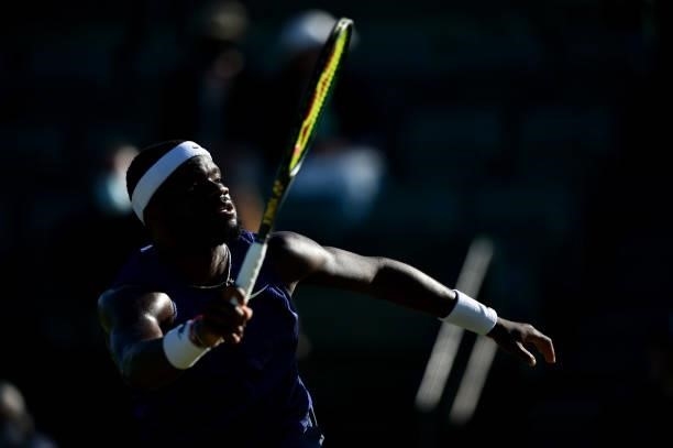 Frances Tiafore of United States plays against Marius Copil of Romania during the men's semi-finals match on day eight of the Viking Open at...