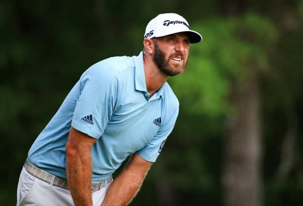 Dustin Johnson watches his shot from the 12th tee during the third round of the Palmetto Championship at Congaree on June 12, 2021 in Ridgeland,...