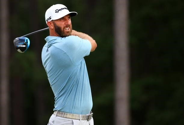 Dustin Johnson plays his shot from the 13th tee during the third round of the Palmetto Championship at Congaree on June 12, 2021 in Ridgeland, South...