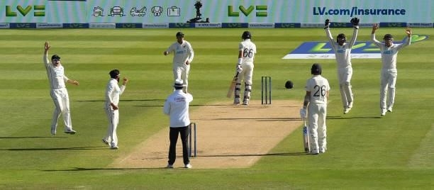 Joe Root of England leaves the field after being dismissed by Ajaz Patel of New Zealand during the third day of the second LV= Test Match between...