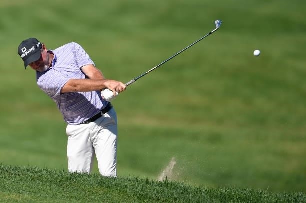 Jerry Kelly hits his third shot on the 18th hole during the second round of the American Family Insurance Championship at University Ridge Golf...