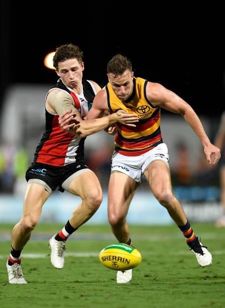 Jack Billings of the Saints and Brodie Smith of the Crows compete for the ball during the round 13 AFL match between the St Kilda Saints and the...