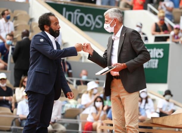 French chair umpire Kader Nouri and President of French Tennis Federation FFT Gilles Moretton during the trophy ceremony of the Women's Singles final...