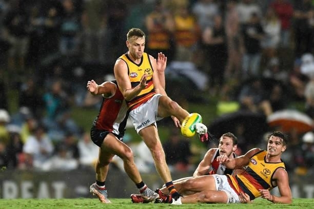 Brodie Smith of the Crows kicks the ball under pressure during the round 13 AFL match between the St Kilda Saints and the Adelaide Crows at Cazaly's...