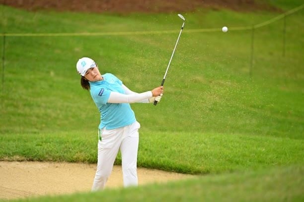 Mone Inami of Japan hits out from a bunker on the 9th hole during the final round of the Ai Miyazato Suntory Ladies Open at Rokko Kokusai Golf Club...