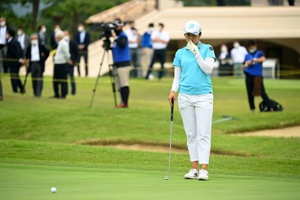 Mone Inami of Japan reacts after missing the par putt on the 9th green during the final round of the Ai Miyazato Suntory Ladies Open at Rokko Kokusai...