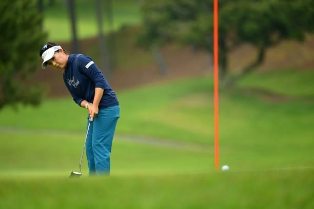 Serena Aoki of Japan holes the birdie putt on the 8th green during the final round of the Ai Miyazato Suntory Ladies Open at Rokko Kokusai Golf Club...