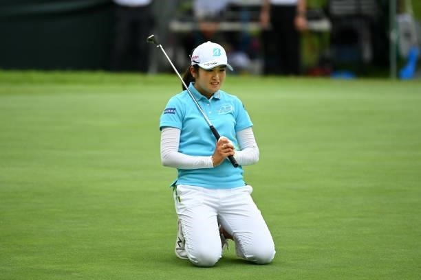 Mone Inami of Japan reacts after missing the birdie putt on the 18th green during the final round of the Ai Miyazato Suntory Ladies Open at Rokko...