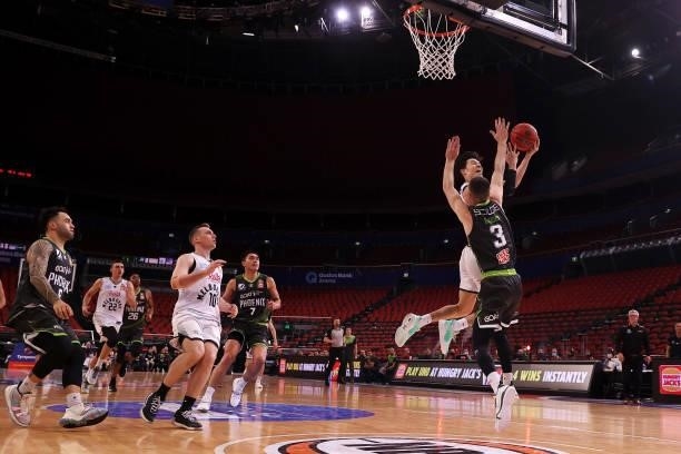 Yudai Baba of Melbourne United lays up a shot during game two of the NBL Semi-Final Series between the South East Melbourne Phoenix and Melbourne...