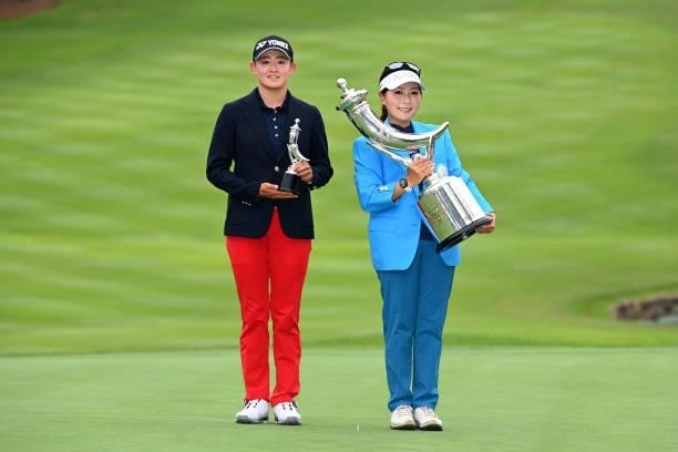 Winner Serena Aoki of Japan and low amateur Akie Iwai pose at the award ceremony following the final round of the Ai Miyazato Suntory Ladies Open at...