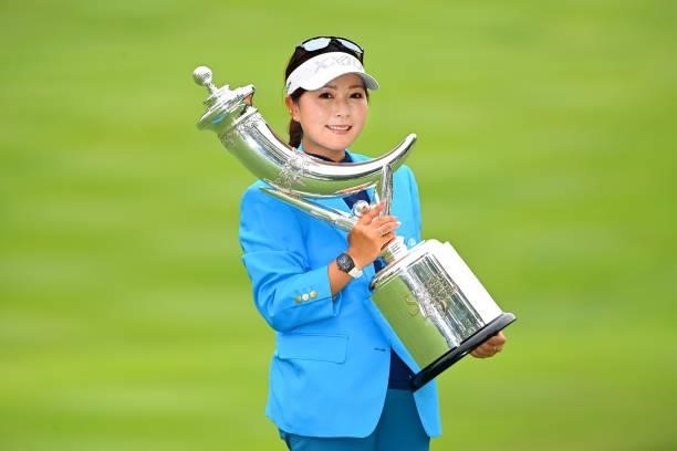 Serena Aoki of Japan poses with the trophy after winning the tournament following the final round of the Ai Miyazato Suntory Ladies Open at Rokko...