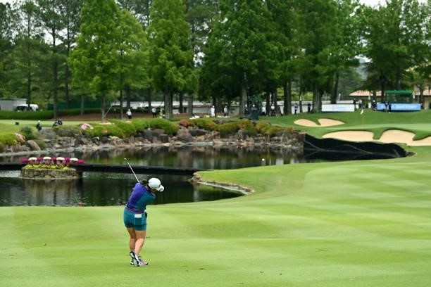 Miyuu Yamashita of Japan hits her second shot on the 18th hole during the final round of the Ai Miyazato Suntory Ladies Open at Rokko Kokusai Golf...