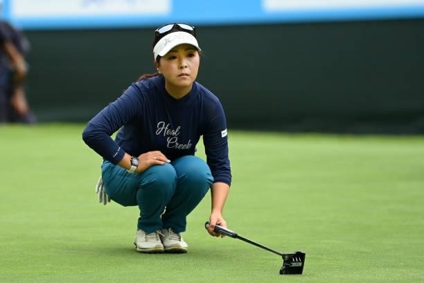 Serena Aoki of Japan lines up a putt on the 18th green during the final round of the Ai Miyazato Suntory Ladies Open at Rokko Kokusai Golf Club on...
