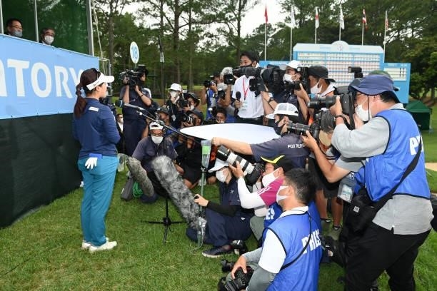 Photographers and television crews surround winner Serena Aoki following the final round of the Ai Miyazato Suntory Ladies Open at Rokko Kokusai Golf...