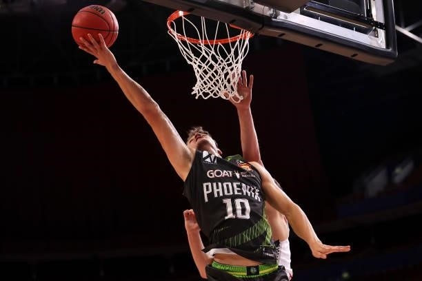 Yanni Wetzall of the Phoenix stretches for the ball during game two of the NBL Semi-Final Series between the South East Melbourne Phoenix and...