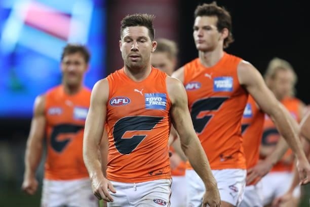 Toby Greene of the Giants looks dejected after the game ended in a draw during the round 13 AFL match between the North Melbourne Kangaroos and the...