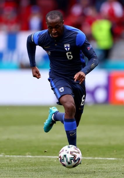 Glen Kamara of Finland runs with the ball during the UEFA Euro 2020 Championship Group B match between Denmark and Finland on June 12, 2021 in...