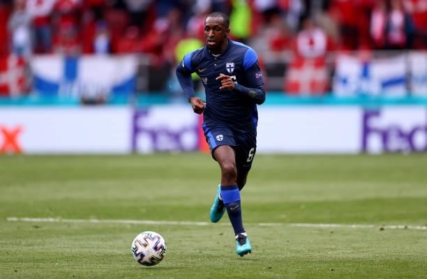 Glen Kamara of Finland runs with the ball during the UEFA Euro 2020 Championship Group B match between Denmark and Finland on June 12, 2021 in...