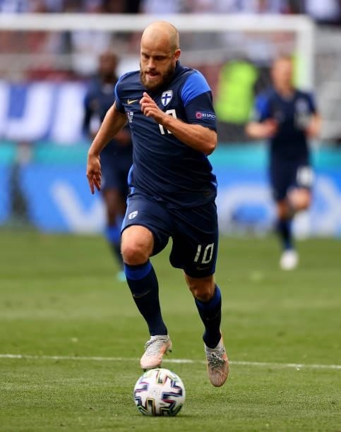 Teemu Pukki of Finland runs with the ball during the UEFA Euro 2020 Championship Group B match between Denmark and Finland on June 12, 2021 in...