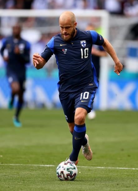 Teemu Pukki of Finland runs with the ball during the UEFA Euro 2020 Championship Group B match between Denmark and Finland on June 12, 2021 in...