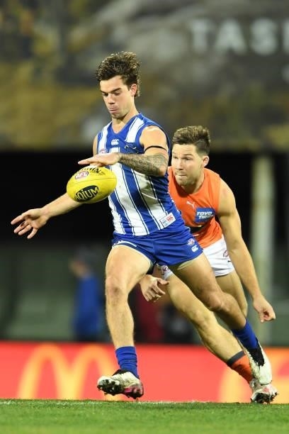 Jy Simpkin of the Kangaroos kicks the ball during the round 13 AFL match between the North Melbourne Kangaroos and the Greater Western Sydney Giants...