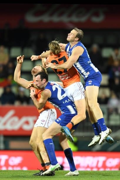 Ben Cunnington of the Kangaroos competes for the ball during the round 13 AFL match between the North Melbourne Kangaroos and the Greater Western...