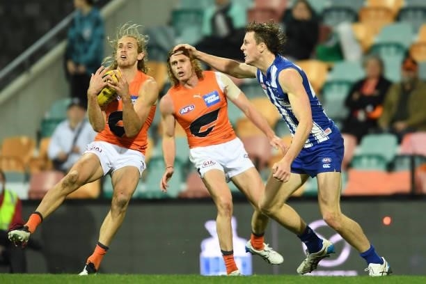 Nick Haynes of the Giants takes a mark during the round 13 AFL match between the North Melbourne Kangaroos and the Greater Western Sydney Giants at...