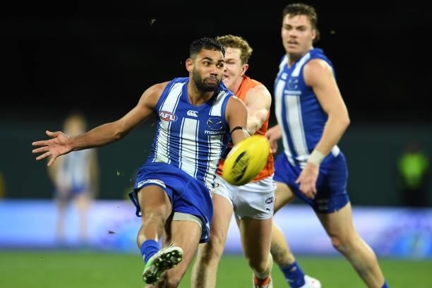 Tarryn Thomas of the Kangaroos kicks the ball during the round 13 AFL match between the North Melbourne Kangaroos and the Greater Western Sydney...