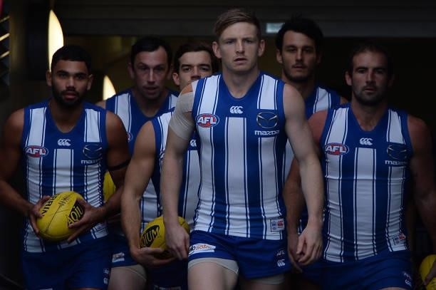 Jack Ziebell of the Kangaroos leads out the team during the round 13 AFL match between the North Melbourne Kangaroos and the Greater Western Sydney...