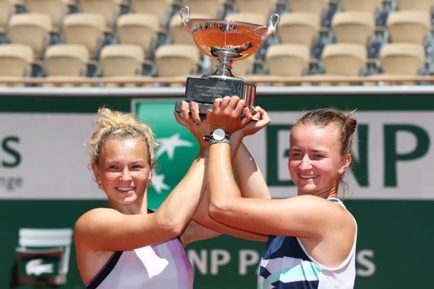 Katerina Siniakova and Barbora Krejcikova of The Czech Republic pose with the trophy after winning their Women's Doubles Final match against Bethanie...