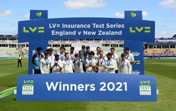 Tom Latham and the New Zealand squad celebrate their series victory after winning the second LV= Test match against England at Edgbaston on June 13,...