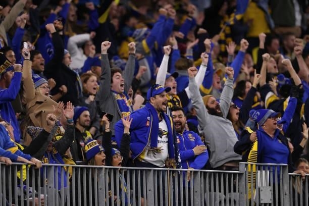 Eagles fans celebrate the winning goal during the round 14 AFL match between the West Coast Eagles and the Richmond Tigers at Optus Stadium on June...