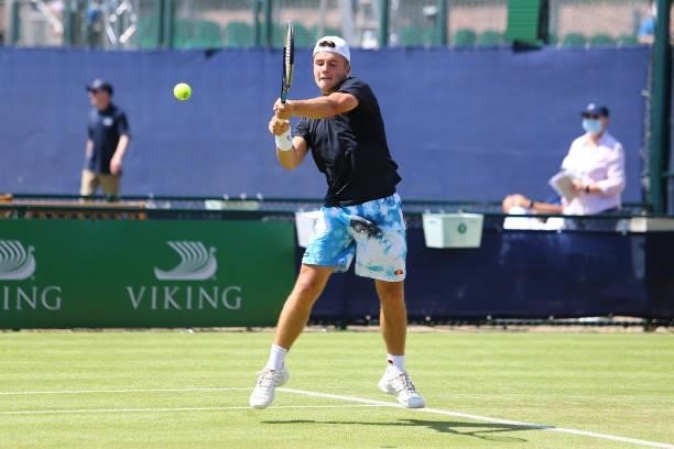 Arthur Fery of Great Britain hits a backhand during day 1 of the Nottingham Trophy at Nottingham Tennis Centre on June 13, 2021 in Nottingham,...